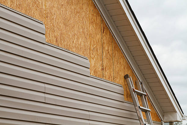 Professional Siding Installation technician working in Winfield, IN